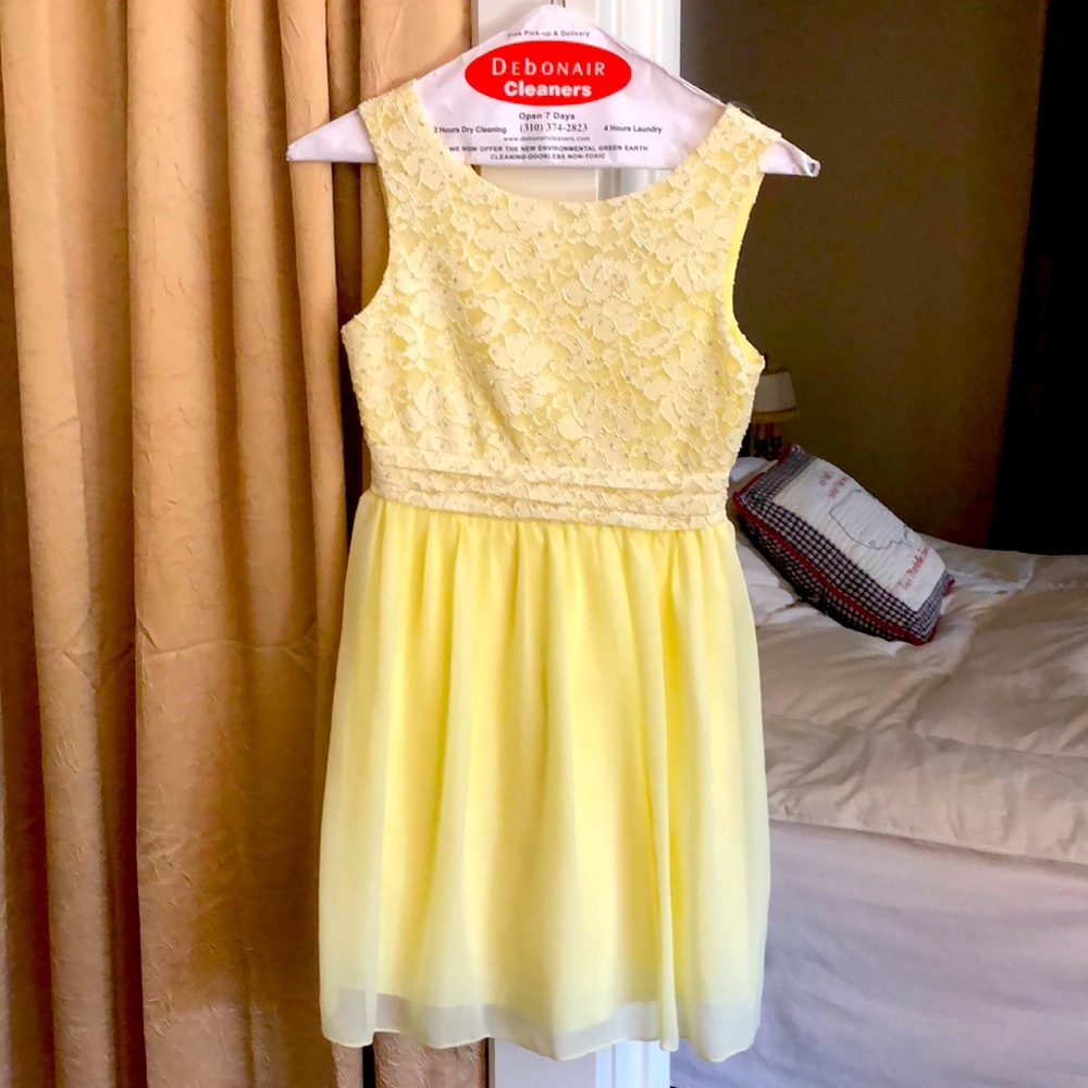 Yellow dress with flower embroidery Size 10.